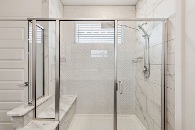 bathroom featuring a stall shower