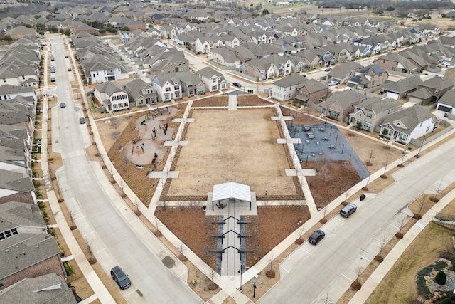 birds eye view of property with a residential view