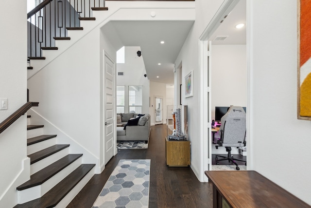 entryway featuring recessed lighting, wood finished floors, visible vents, baseboards, and stairway