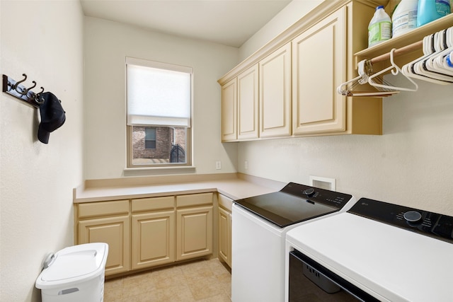 washroom featuring cabinet space and washer and dryer