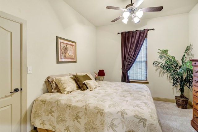 bedroom with carpet floors, baseboards, and a ceiling fan