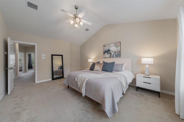 bedroom featuring visible vents, light carpet, vaulted ceiling, ceiling fan, and baseboards