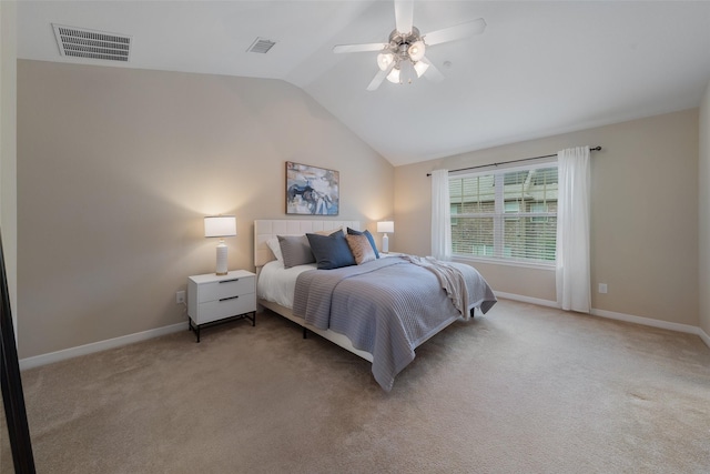 bedroom with lofted ceiling, light carpet, a ceiling fan, visible vents, and baseboards