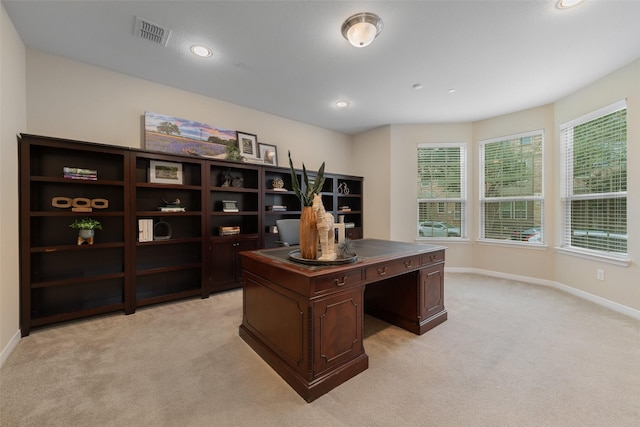 office area featuring light carpet, visible vents, baseboards, and recessed lighting