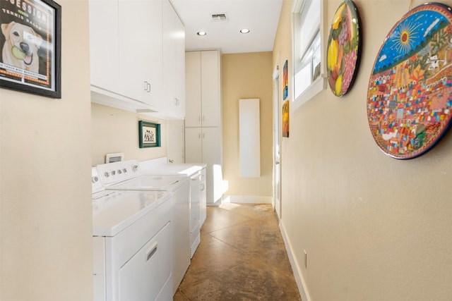 clothes washing area featuring cabinet space, baseboards, visible vents, washer and clothes dryer, and recessed lighting