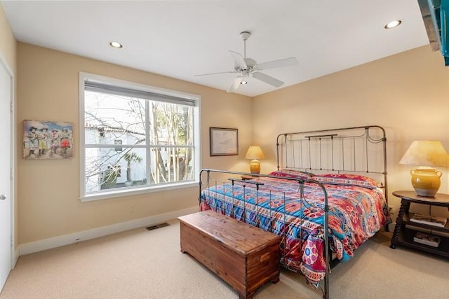 carpeted bedroom with baseboards, visible vents, ceiling fan, and recessed lighting