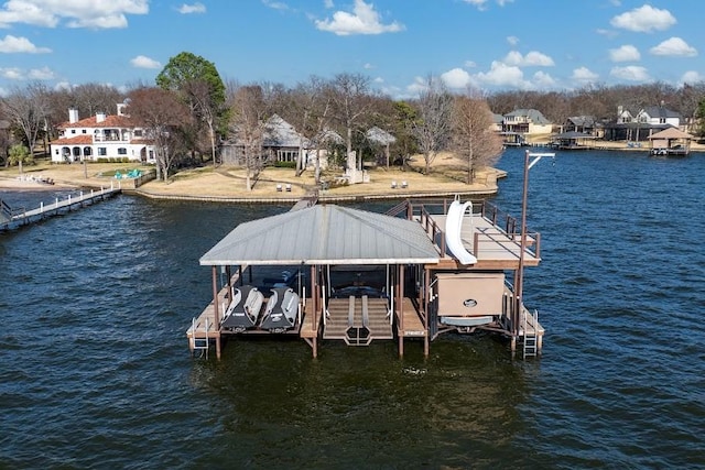 dock area featuring a water view and boat lift