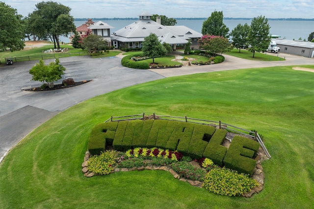 drone / aerial view with a water view