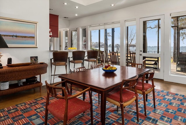 dining area featuring recessed lighting, visible vents, and tile patterned floors