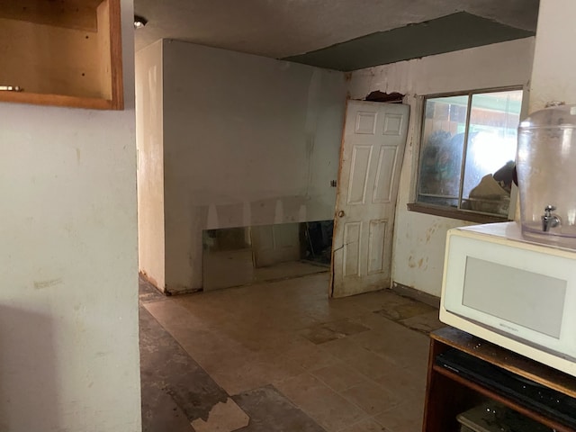 interior space with white microwave