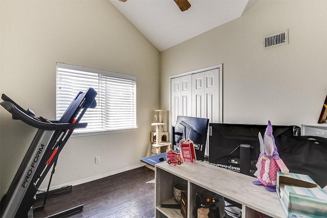 office with baseboards, visible vents, lofted ceiling, ceiling fan, and wood finished floors