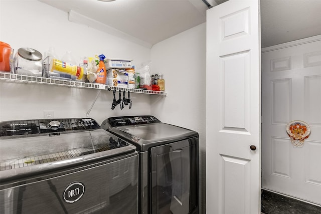 laundry area with washing machine and dryer and laundry area