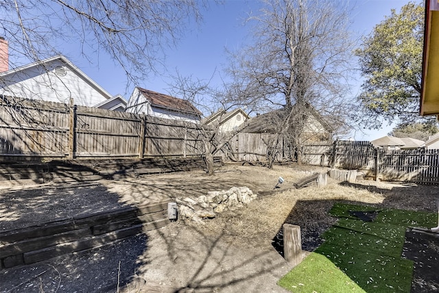 view of yard featuring a fenced backyard