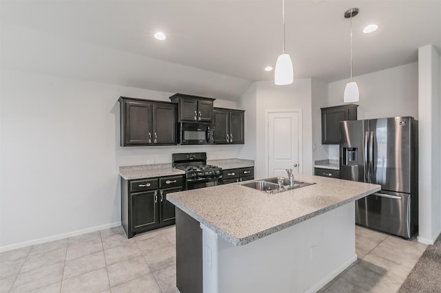 kitchen with black appliances, hanging light fixtures, a sink, and light countertops