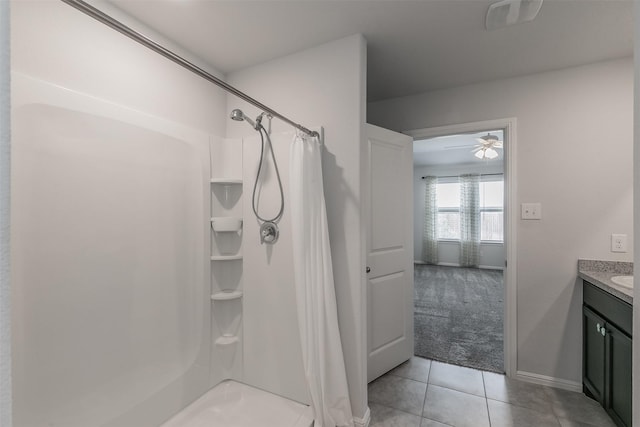 bathroom featuring a stall shower, tile patterned flooring, visible vents, and vanity