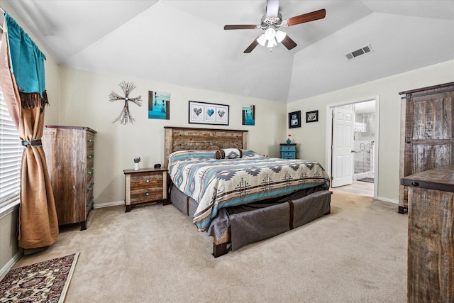 bedroom with carpet flooring, visible vents, baseboards, vaulted ceiling, and ensuite bath