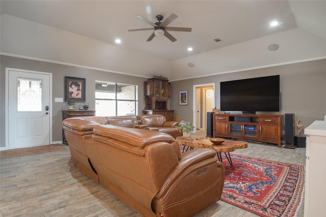 living room with vaulted ceiling, light wood finished floors, a ceiling fan, and recessed lighting