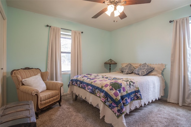 bedroom featuring ceiling fan and carpet floors