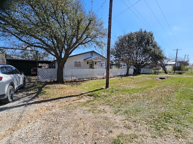 view of yard with fence