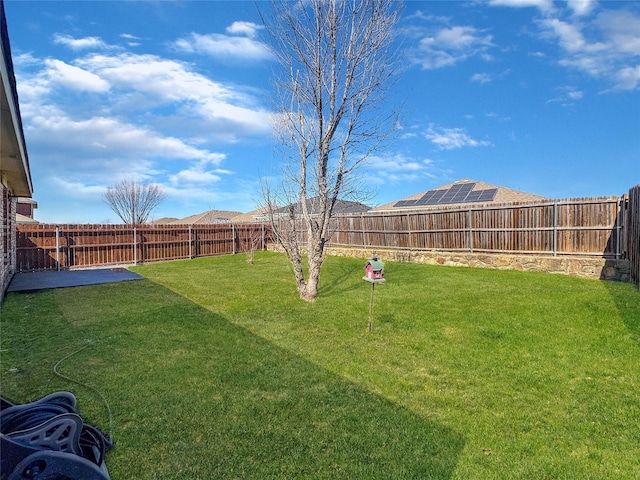 view of yard featuring a fenced backyard