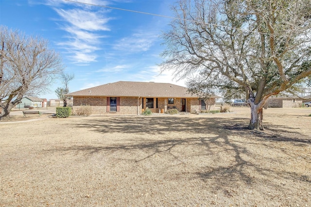 ranch-style home with brick siding