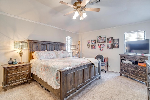 bedroom featuring visible vents, crown molding, and multiple windows