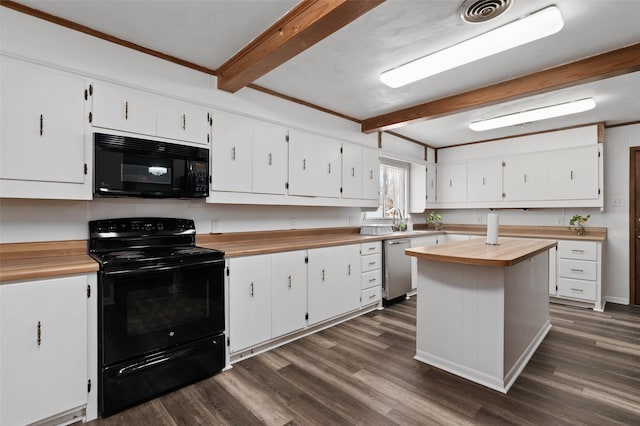 kitchen with visible vents, butcher block countertops, dark wood-type flooring, beamed ceiling, and black appliances