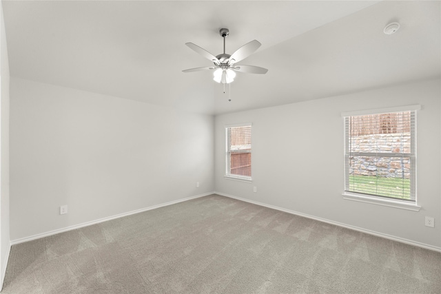 1825 Osage Trl, Mesquite, TX 75149 - carpeted empty room featuring plenty of natural light, ceiling fan, and baseboards