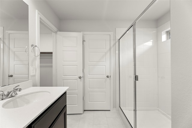 1825 Osage Trl, Mesquite, TX 75149 - bathroom with a shower stall, tile patterned floors, and vanity