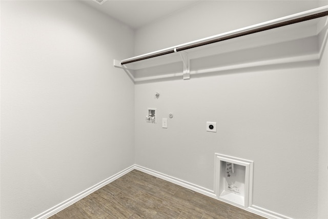 1825 Osage Trl, Mesquite, TX 75149 - washroom with hookup for a gas dryer, hookup for an electric dryer, washer hookup, wood finished floors, and baseboards