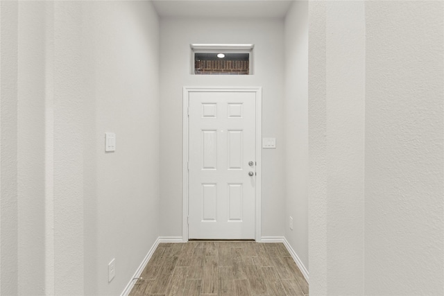 1825 Osage Trl, Mesquite, TX 75149 - doorway with wood finished floors and baseboards