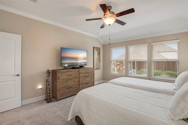 bedroom featuring carpet floors, lofted ceiling, ornamental molding, and baseboards