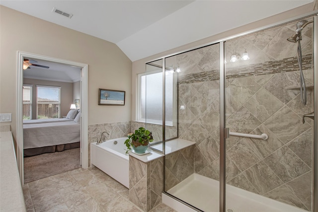 ensuite bathroom featuring visible vents, lofted ceiling, ensuite bath, a shower stall, and a bath