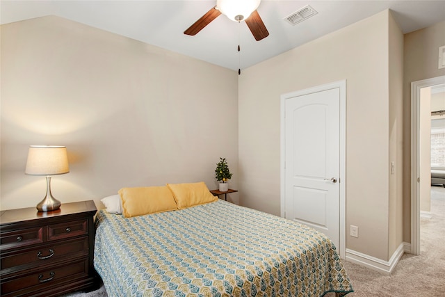 bedroom with baseboards, visible vents, ceiling fan, and light colored carpet