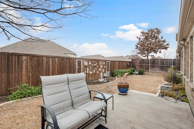 view of patio featuring a fenced backyard