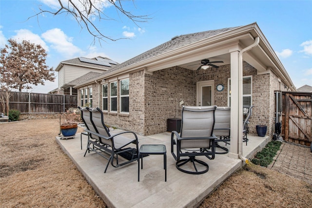 view of patio featuring ceiling fan and a fenced backyard