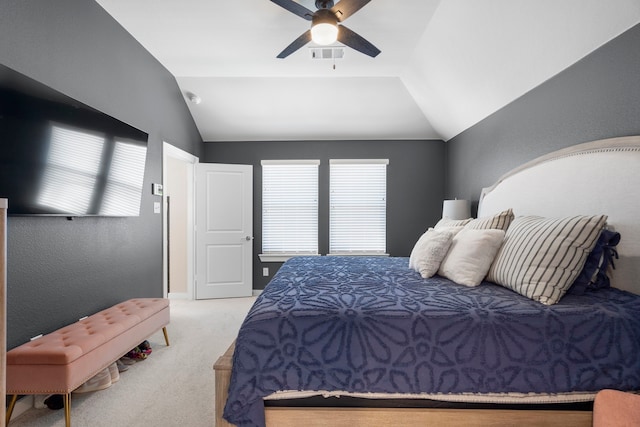 bedroom with carpet, multiple windows, visible vents, and vaulted ceiling