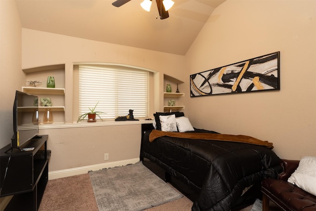 carpeted bedroom featuring vaulted ceiling, ceiling fan, and baseboards