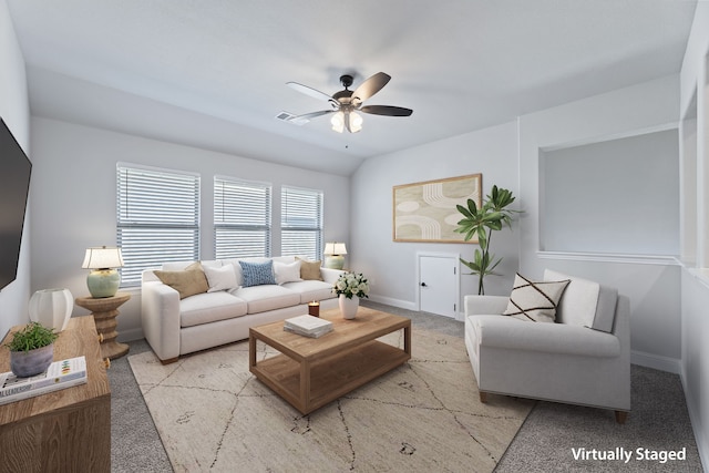 living room with baseboards, visible vents, a ceiling fan, vaulted ceiling, and carpet flooring