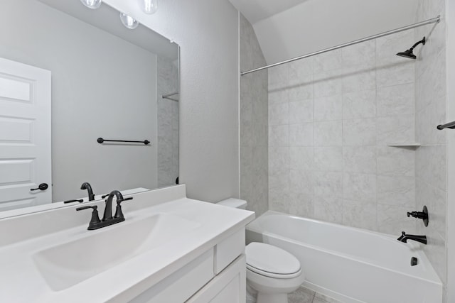 full bathroom featuring tub / shower combination, vanity, and toilet