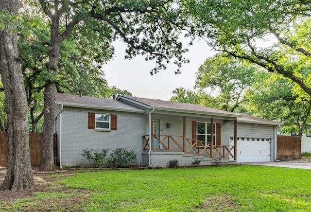 ranch-style home with brick siding, a porch, a front yard, fence, and a garage