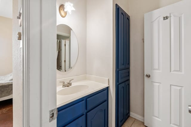 bathroom featuring tile patterned floors and vanity