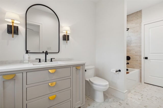 full bath featuring toilet, vanity, and bathtub / shower combination