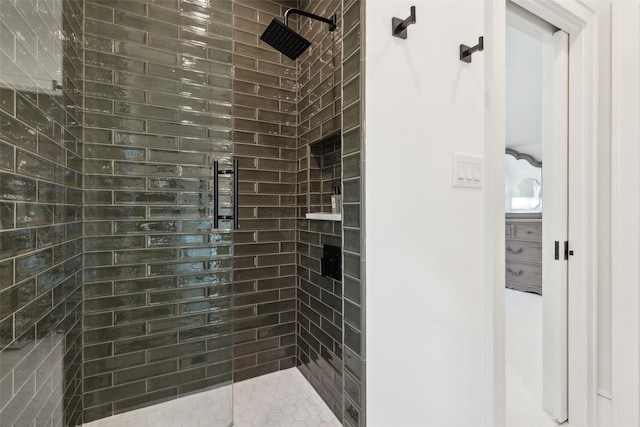 full bath featuring tiled shower