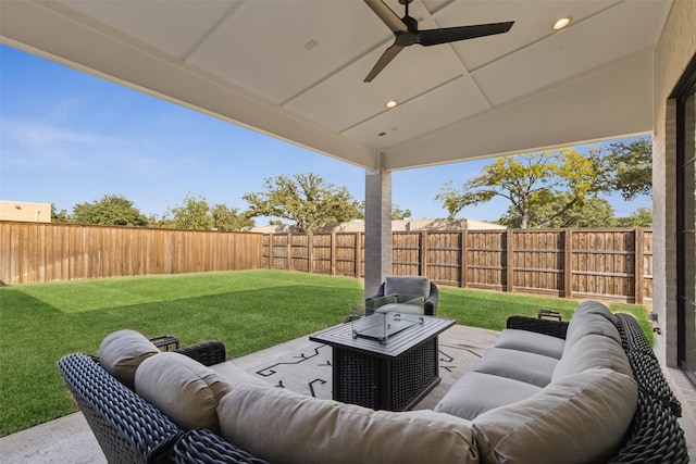 view of patio / terrace with outdoor lounge area, a ceiling fan, and a fenced backyard