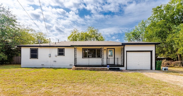 ranch-style house featuring dirt driveway, an attached garage, covered porch, crawl space, and a front lawn