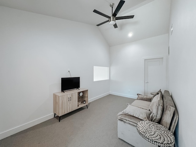 living area with baseboards, vaulted ceiling, light colored carpet, and ceiling fan