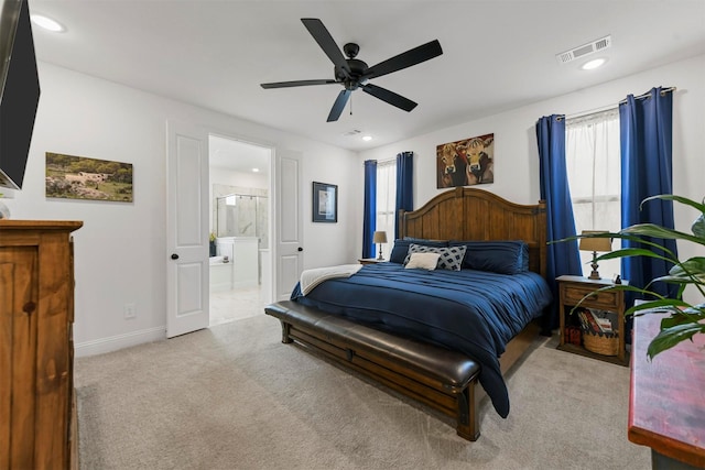 carpeted bedroom featuring baseboards, visible vents, ceiling fan, ensuite bathroom, and recessed lighting