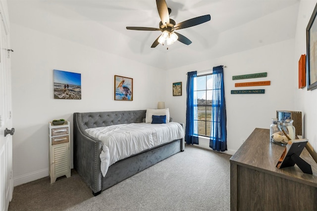 bedroom with carpet floors, ceiling fan, and baseboards