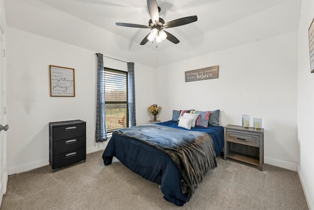 bedroom featuring carpet flooring, a ceiling fan, and baseboards